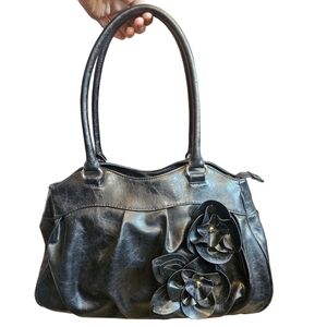 Nicole Miller floral embellished bag.